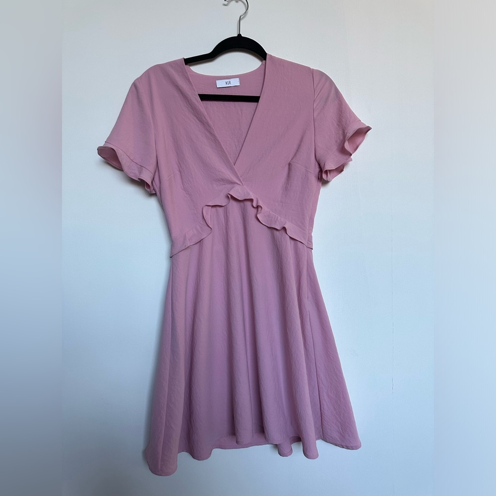 Baby pink dress.